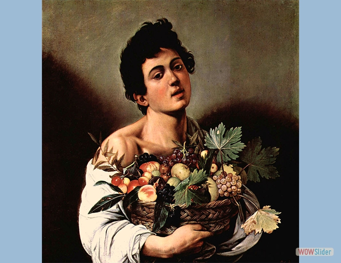 chico con cesto de frutas